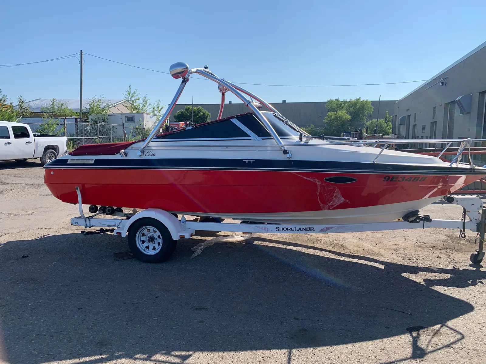 Ski boat with full red hull colour wrap