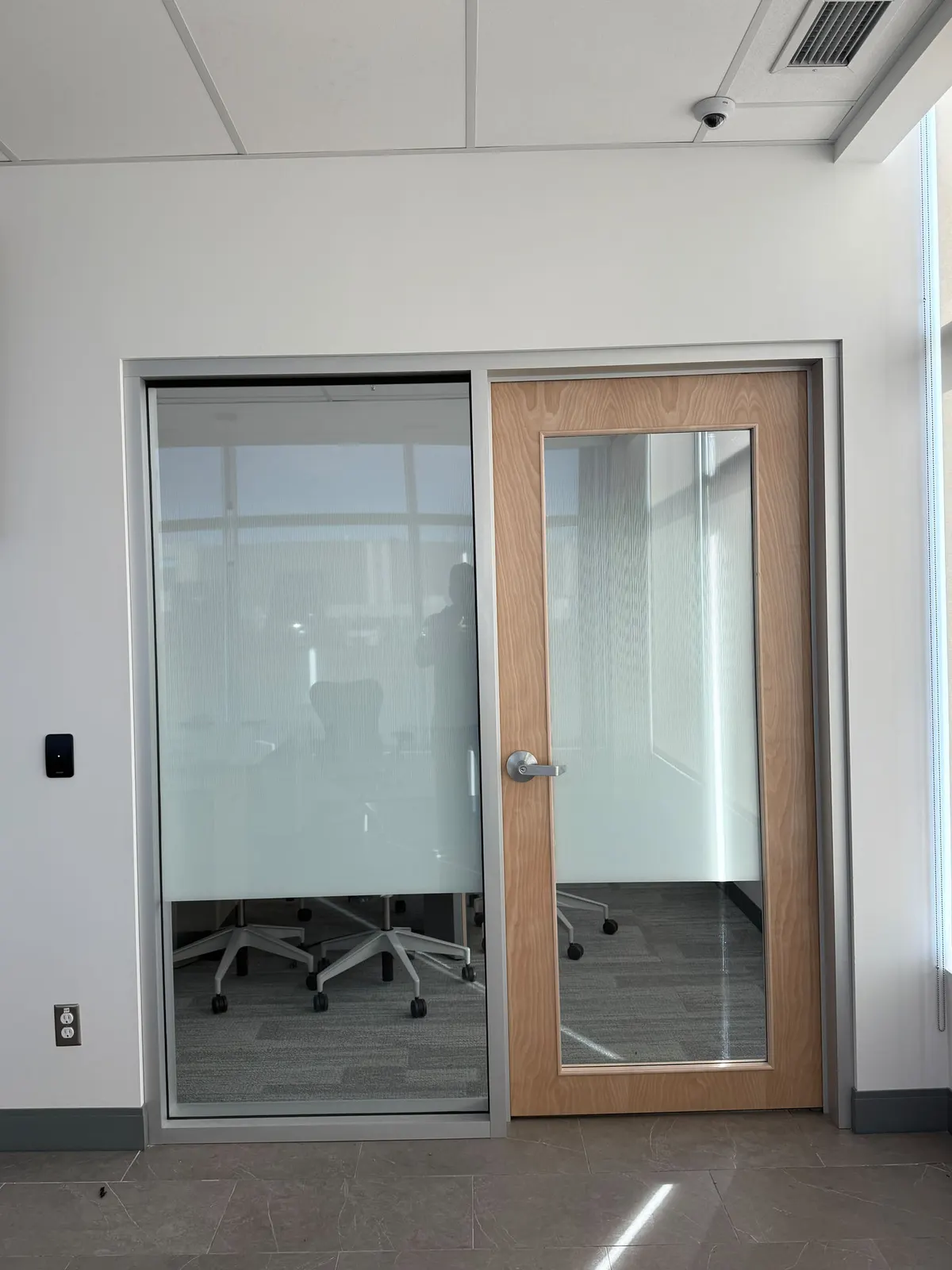 Frosted privacy band on a meeting room window