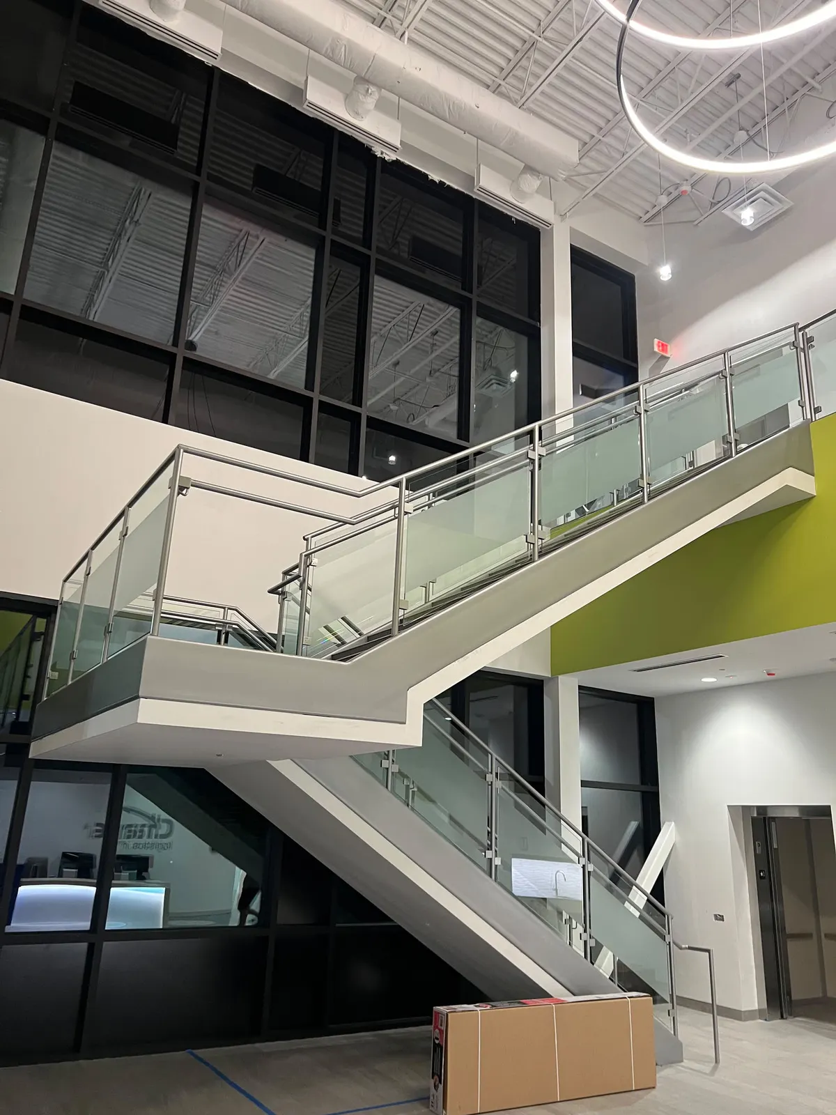 Frosted film on glass stair railing panels