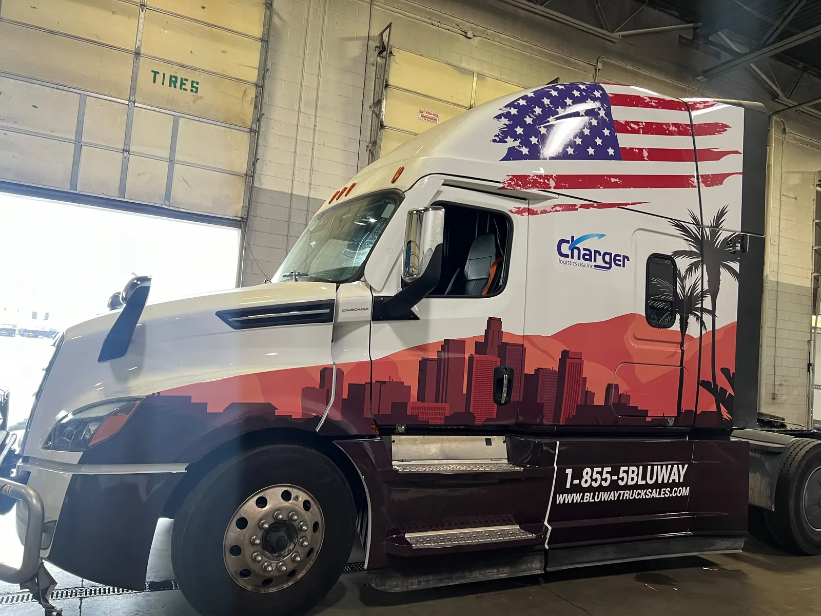 Fully wrapped Freightliner semi truck