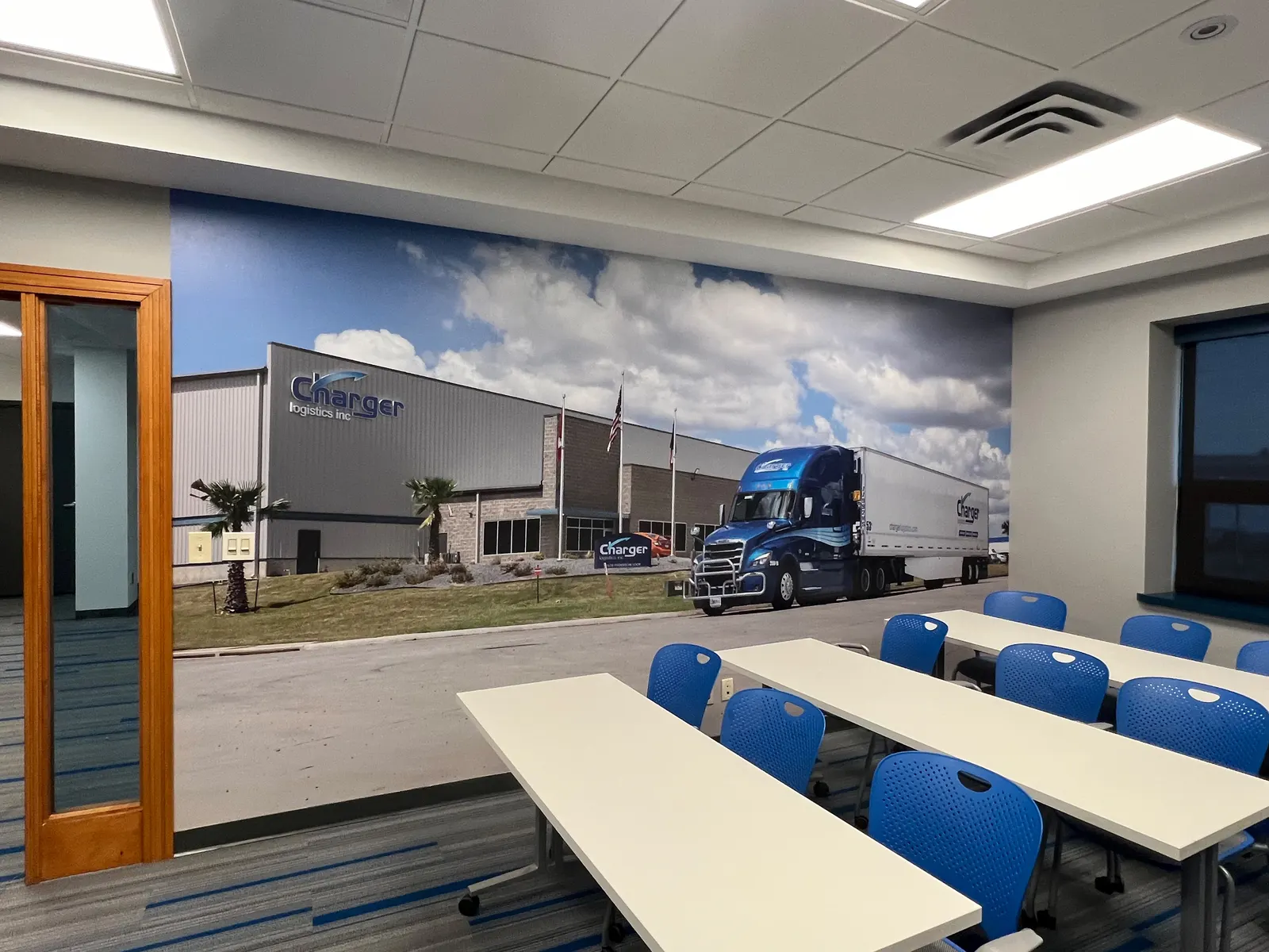 Facility photo mural in a training room